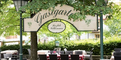 Essen-gehen - Gerichte: Schnitzel - Salzkammergut - Gastgarten  - Hotel Landgasthof Ragginger ****