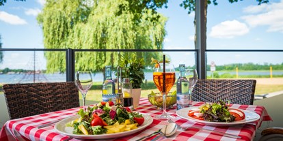 Essen-gehen - Preisniveau: €€ - Strandhaus am Inselsee