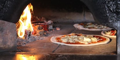 Essen-gehen - Gerichte: Pizza - Holzofenpizza - Restaurant-Kastell-Sulz am Neckar