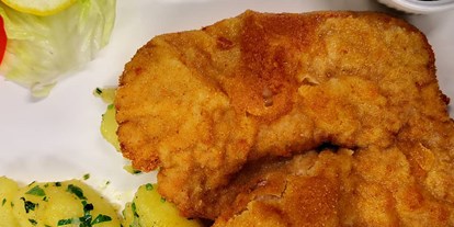 Essen-gehen - Gerichte: Schnitzel - Schnitzel mit Petersilienkartoffeln - Hapimag Resort Zell am See - Restaurant "Insa's"