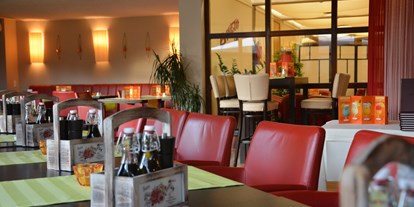 Essen-gehen - Gerichte: Pizza - Tennengau - Gemütliches Ambiente mit herrlichem Blick in den Garten - La Lontra, Pizzeria im Parkhotel Brunauer