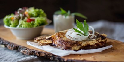 Essen-gehen - Gerichte: Fondue & Raclette - Österreich - Feine Spezialitäten im Restaurant Ainkehr Katschberg. - Restaurant Ainkehr Katschberg