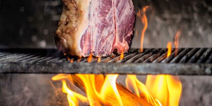 Essen-gehen - Gerichte: Fondue & Raclette - Österreich - Die besten Steaks der Welt im Restaurant Ainkehr am Katschberg. - Restaurant Ainkehr Katschberg