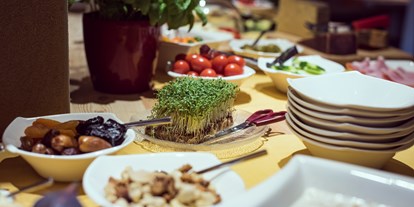 Essen-gehen - Art der Küche: mediterran - Österreich - Gemütlich und genüsslich frühstücken im aufatmen - aufatmen | naturhotel . tirol