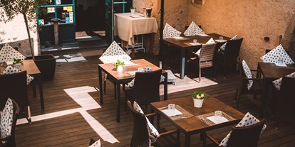 Essen-gehen - grüner Gastgarten - Italien - Restaurant Panholzer