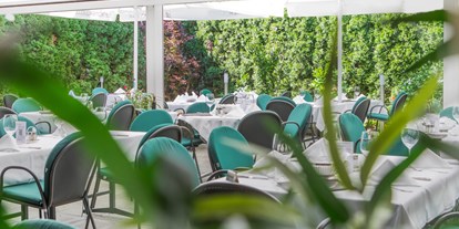 Essen-gehen - grüner Gastgarten - Österreich - Restaurant Burkia