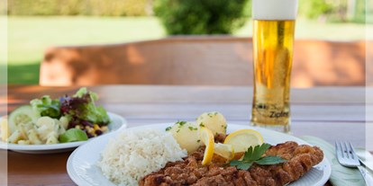 Essen-gehen - grüner Gastgarten - Badhof - Regionale österr. Küche und große Auswahl an Salaten und vegetarischen Gerichten. - Familiengasthof Blasl