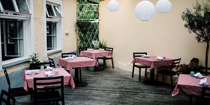 Essen-gehen - grüner Gastgarten - Hallwang (Hallwang) - Restaurant Paradoxon
