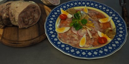 Essen-gehen - Art der Küche: österreichisch - PLZ 5132 (Österreich) - Kalte Sulze - Gössnitzer