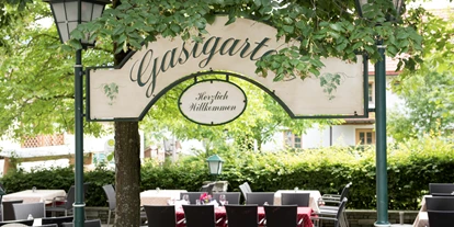 Essen-gehen - grüner Gastgarten - Eisenpalmsdorf - Gastgarten  - Hotel Landgasthof Ragginger ****