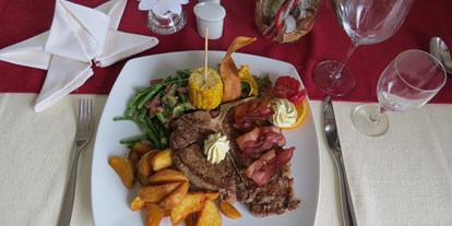 Essen-gehen - Art der Küche: international - PLZ 8962 (Österreich) - T-Bone Steak - Hotel Restaurant Loy