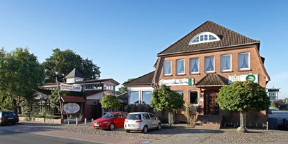 Essen-gehen - Preisniveau: €€ - Barum (Landkreis Lüneburg) - marschachter hof -Ansicht mit Altbau und Saal - Marschachter Hof
