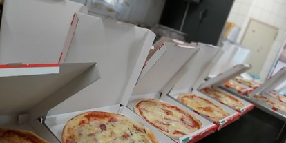 Essen-gehen - Gerichte: Pizza - GenussZentrale