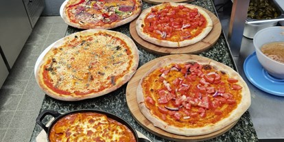 Essen-gehen - Sitzplätze im Freien - Restaurant Pizzeria Amara