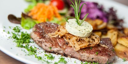 Essen-gehen - Gerichte: Meeresfrüchte - Ostseeküste - Fleisch- und Fischgerichte - Restaurant & Café Friesenhof