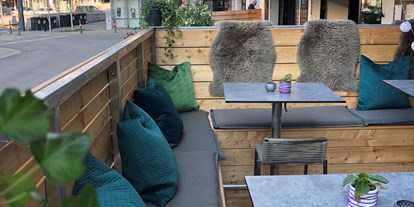 Essen-gehen - Sitzplätze im Freien - Wien Floridsdorf - Vip Lounge  - Zuckergoscherl am Rochusmarkt