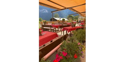 Essen-gehen - Gerichte: Schnitzel - Tirol - Sonnenterrasse für groß und klein,
Kinderspielplatz - Kirchenwirt in Maurach Achensee