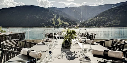 Essen-gehen - Sitzplätze im Freien - Mitterhofen - Restaurant direkt am See in Zell am See. - SEENSUCHT - Restaurant am See