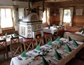 Restaurant: Urige Atmosphäre am wohlig warmen Kachelofen. Ideal auch für Feiern! - Gasthaus Krallinger