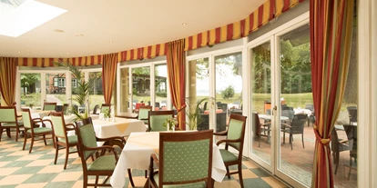 Essen-gehen - Ambiente: klassisch - Wintergarten - Restaurant "Schröders" im Kurhaus am Inselsee