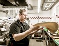 Restaurant: Pizza making - Landgasthof Ortner