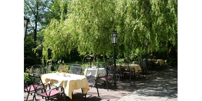 Essen-gehen - Ambiente: klassisch - Sommergartenterrasse und extra Biergarten im Grünen. - Rauchkate Beverstedt