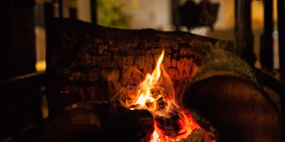 Essen-gehen - Ambiente: klassisch - Steaks, Schnitzel und Spare Ribs werden grundsätzlich über dem offenen Grillfeuer vor den Augen der Gäste im Gastraum zubereitet. - Rauchkate Beverstedt
