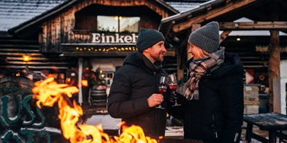 Essen-gehen - Ambiente: klassisch - Aperitif an der Feuerschale - Trattlers Einkehr