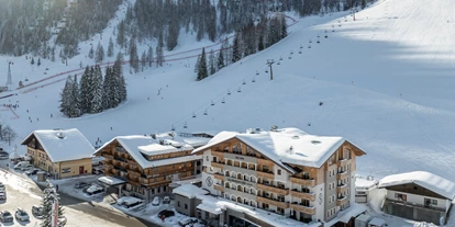 Essen-gehen - Spielplatz - Hotelansicht Winter - Hotel Salzburger Hof Zauchensee