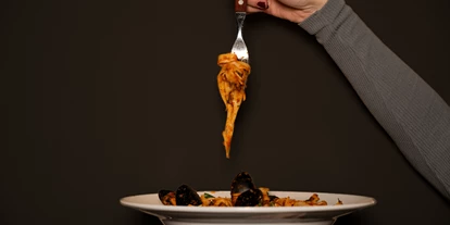 Essen-gehen - Ambiente: klassisch - ©Chrissy Kampl | My Alpenwelt Resort - Pizzeria Amore