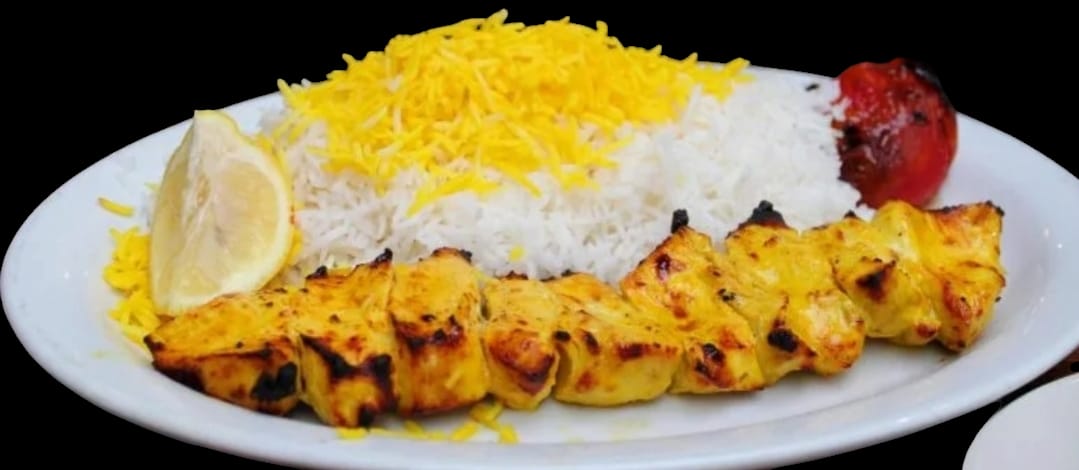 Essen-gehen - Italien - Chicken kebab with special rice. You will not forget the unique taste of the rice. - BARAN Restaurant