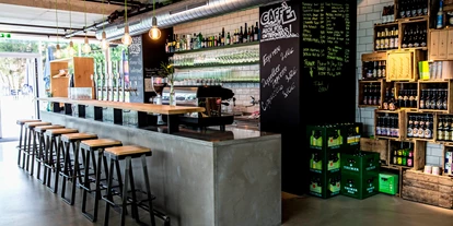 Essen-gehen - rollstuhlgerecht - Salzburg-Stadt Liefering - Barbereich & Bier Shop - TRUMEREI - Bar, Restaurant & Bier Shop