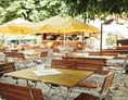 Restaurant: Gastgarten im Sommer - Hotel Gasthof Adler