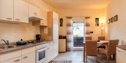 Essen-gehen - Ambiente: klassisch - eigene Küche in Ihrem Appartment - Restaurant Südtiroler Stube
