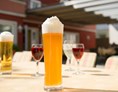 Restaurant: Ob zum erfrischenden Bier in unserem Gastgarten oder zur nachmittäglichen Kaffeepause - bei uns sind Sie immer herzlich willkommen! - Restaurant Dollinger